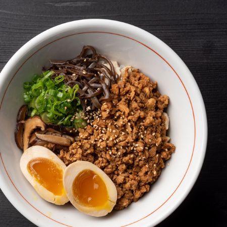 CHICKEN CHASHU BOWL - slow-braised chicken breast “chashu”, ground chicken soboro, kikurage, green onion, seasoned egg*, sesame seeds