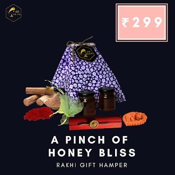 A pinch of Honey bliss:Eco friendly hand made rakhi (1) + hand made gift pack +2 Honey bottles(70g) + designer diya+ sunflower seeds+tilak