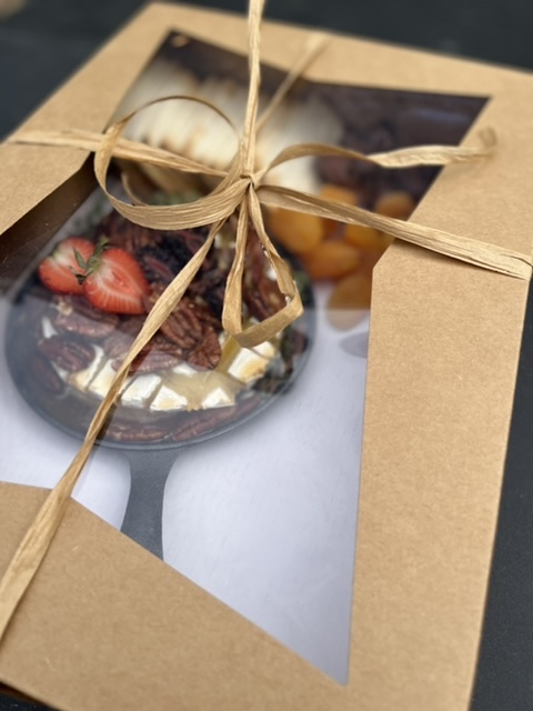 Is this a gift? If so, would you like to include a gift message?          (Pictured: Baked Caramel Pecan Brie Gift Box)