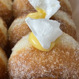 Lemon Curd Meringue - Homemade lemon curd filled sourdonuts topped with meringue 